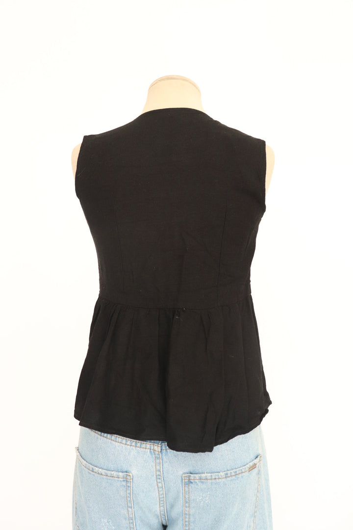 Chaleco Peplum Lino