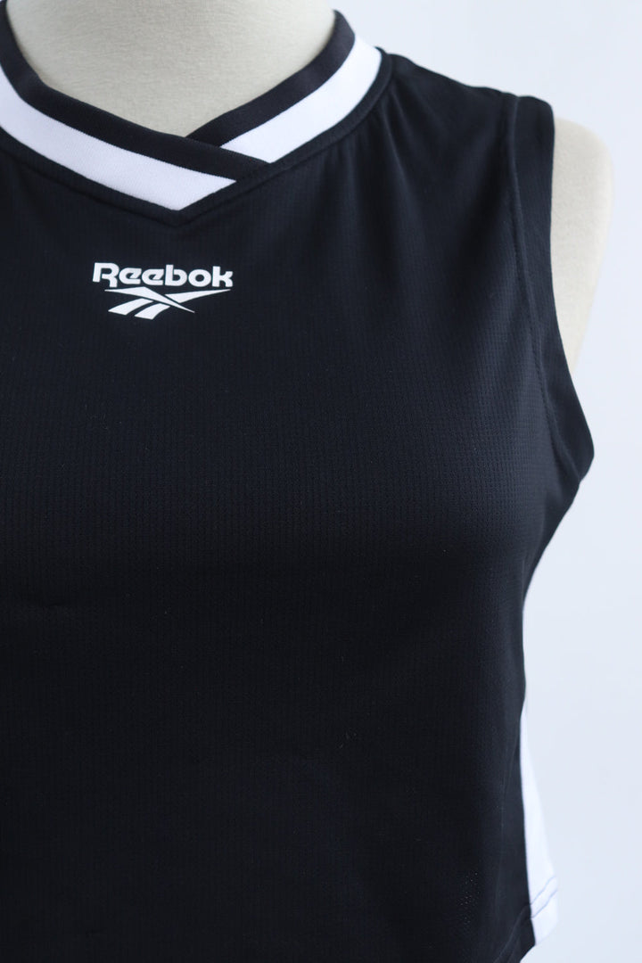 Top Ejercicio Reebok