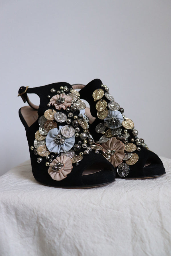 Tacones Negros monedas