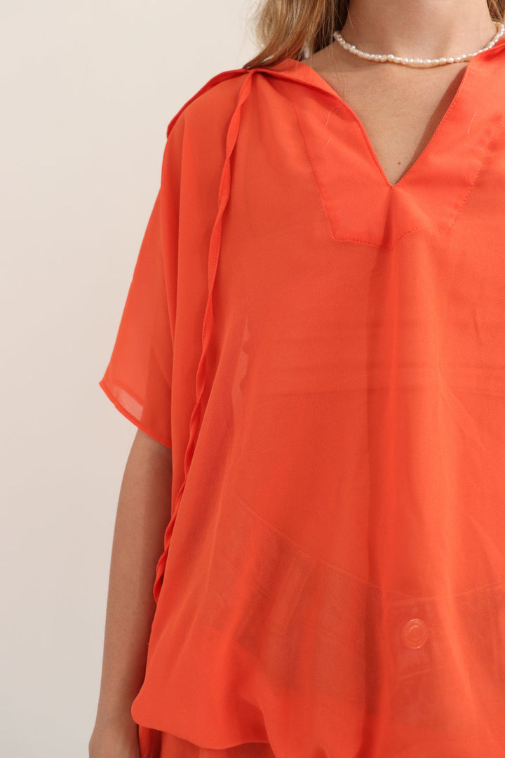 Top Naranja Transparente