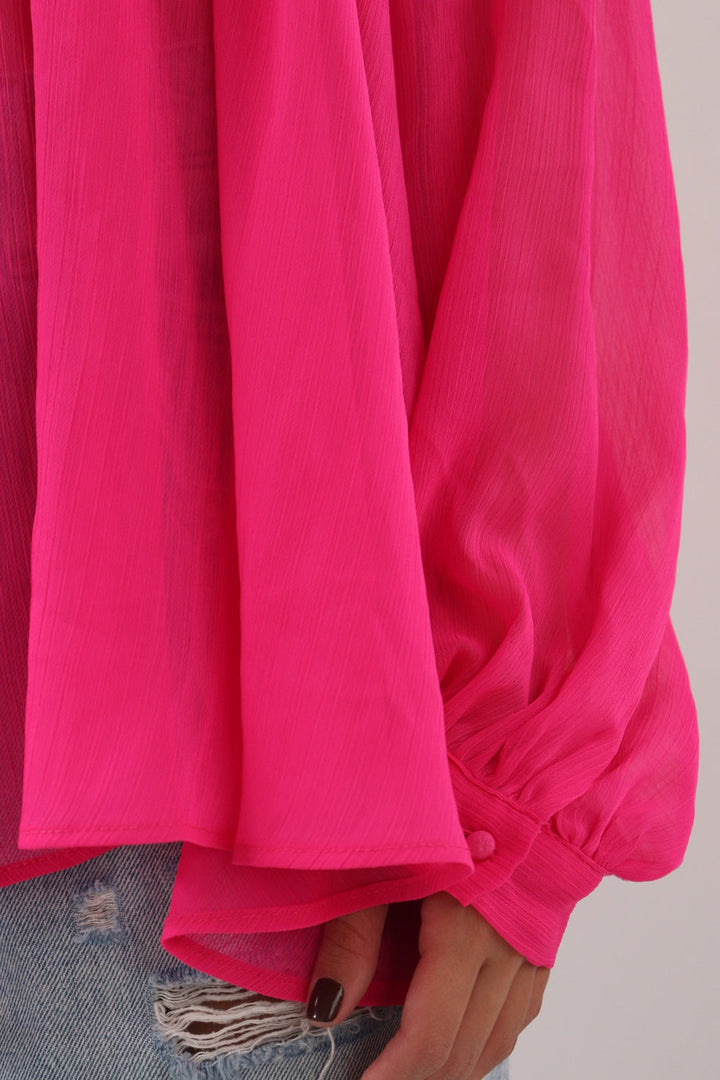 Top Fucsia Traslucido